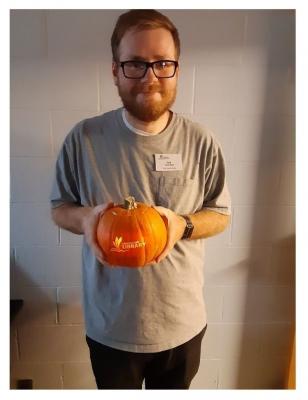 Rob Mpoledor and the pumpkin laser-engraved in the Makerspace